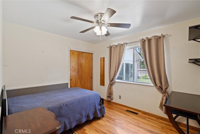 1094 Manzanita Ave, Chico, CA 95926 - bedroom featuring wood finished floors, ceiling fan, and a closet