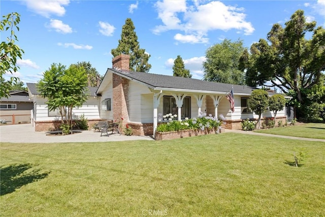 1094 Manzanita Ave, Chico, CA 95926 - single story home featuring brick siding, a front lawn, and a chimney