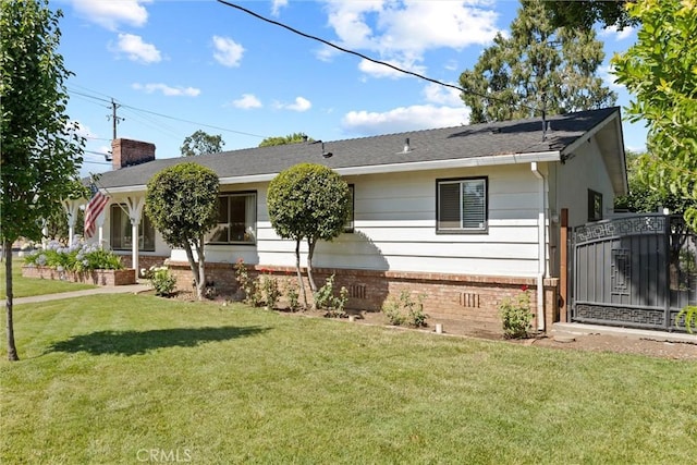 1094 Manzanita Ave, Chico, CA 95926 - ranch-style house with a chimney, a front yard, and a gate