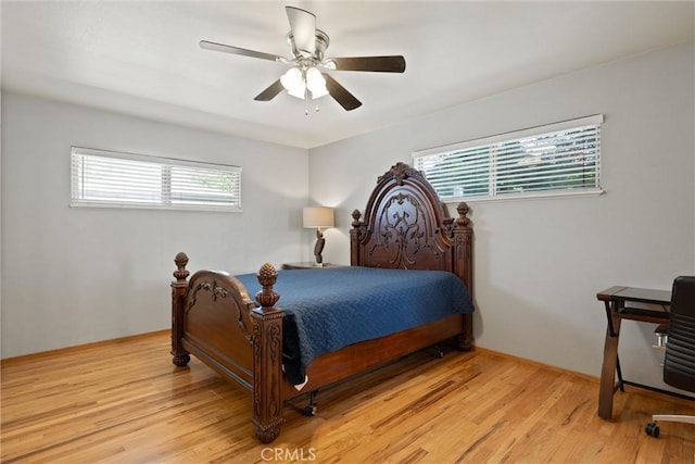 1094 Manzanita Ave, Chico, CA 95926 - bedroom featuring multiple windows, light wood-style flooring, and a ceiling fan