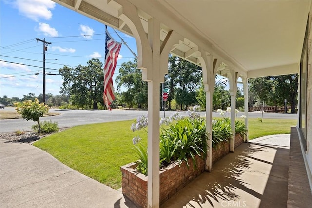1094 Manzanita Ave, Chico, CA 95926 - covered porch featuring a yard