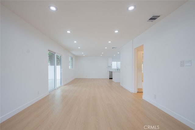 7734 N Glenoaks Blvd, Burbank, CA 91504 - unfurnished living room with light wood-style flooring and recessed lighting