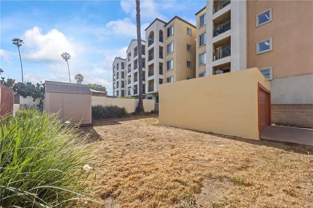 8727 S Harvard Blvd, Los Angeles, CA 90047 - view of yard with a shed