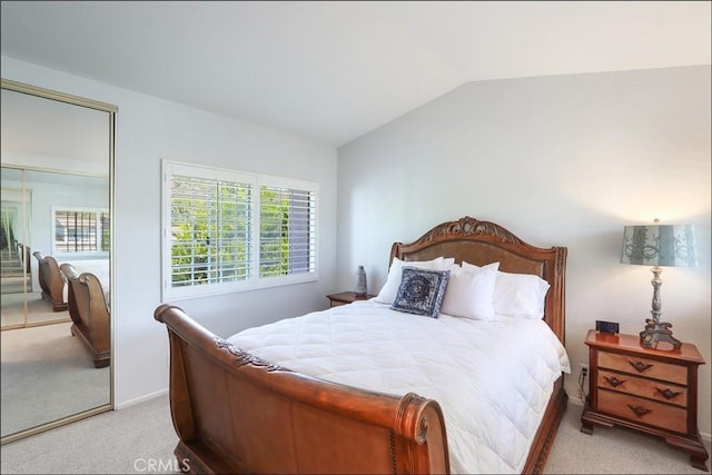 3 Blue Heron Ln, Aliso Viejo, CA 92656 - bedroom with light carpet, lofted ceiling, and a closet