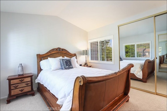 3 Blue Heron Ln, Aliso Viejo, CA 92656 - bedroom featuring light colored carpet, lofted ceiling, and a closet