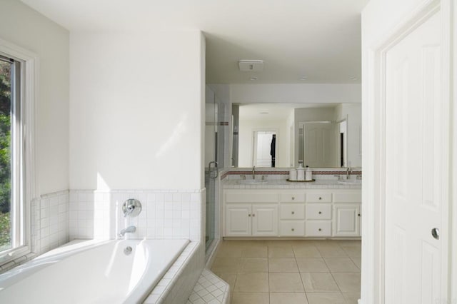 17274 Calle Mayor, Rancho Santa Fe, CA 92067 - full bathroom featuring double vanity, a bath, a shower stall, and tile patterned flooring