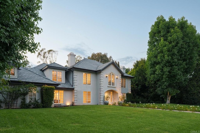 17274 Calle Mayor, Rancho Santa Fe, CA 92067 - view of front of property with a chimney, stucco siding, and a front yard