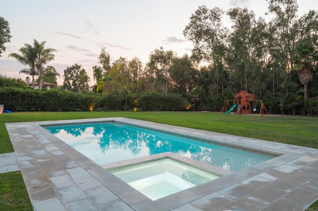 17274 Calle Mayor, Rancho Santa Fe, CA 92067 - view of swimming pool with a lawn, a playground, and a pool with connected hot tub