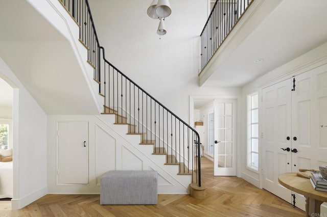 17274 Calle Mayor, Rancho Santa Fe, CA 92067 - foyer with stairs, a towering ceiling, and arched walkways