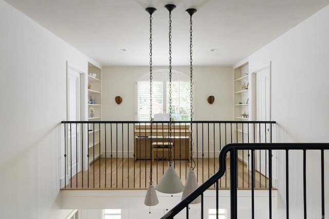 17274 Calle Mayor, Rancho Santa Fe, CA 92067 - hall featuring built in shelves and an upstairs landing