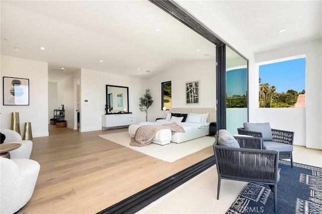 19031 Fowler Ave, North Tustin, CA 92705 - bedroom with wood finished floors, recessed lighting, and lofted ceiling