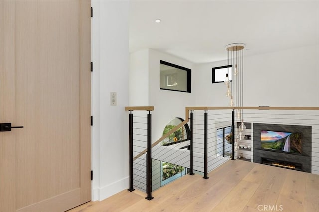 19031 Fowler Ave, North Tustin, CA 92705 - hall featuring an upstairs landing and wood finished floors