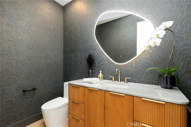 19031 Fowler Ave, North Tustin, CA 92705 - bathroom featuring wallpapered walls and vanity
