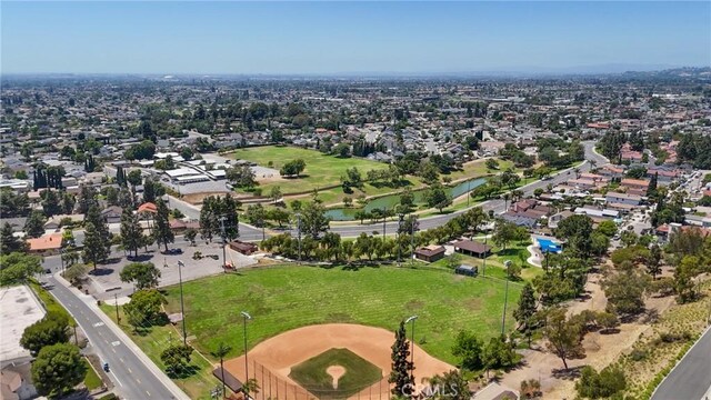 19031 Fowler Ave, North Tustin, CA 92705 - aerial view of residential area featuring a nearby body of water and a local golf course