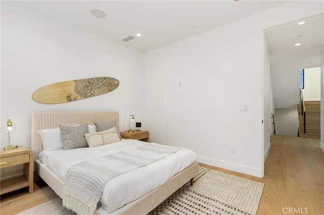19031 Fowler Ave, North Tustin, CA 92705 - bedroom featuring wood finished floors and recessed lighting