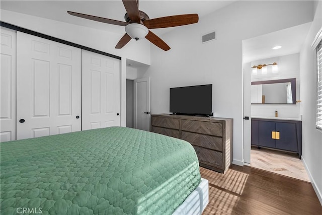 27814 Caraway Ln, Saugus, CA 91350 - bedroom featuring dark wood-style flooring, vaulted ceiling, a closet, a ceiling fan, and ensuite bath