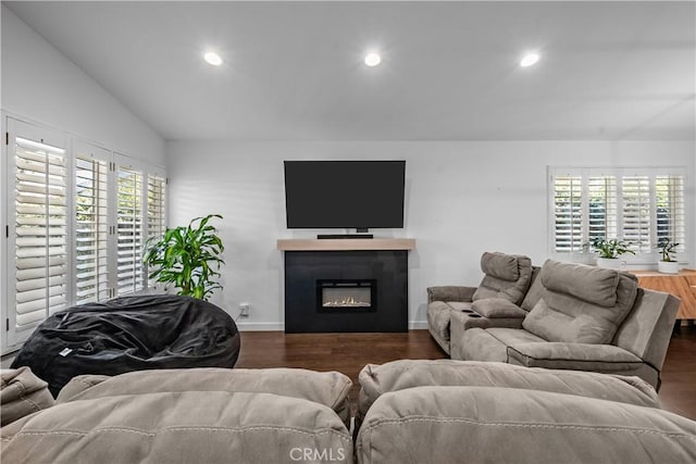 27814 Caraway Ln, Saugus, CA 91350 - living area with recessed lighting, dark wood-type flooring, a glass covered fireplace, and lofted ceiling
