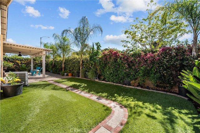 27814 Caraway Ln, Saugus, CA 91350 - fenced backyard with a patio and a ceiling fan