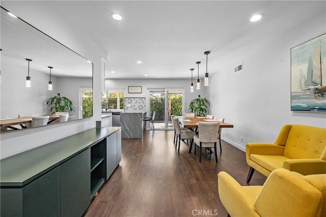 27814 Caraway Ln, Saugus, CA 91350 - kitchen featuring recessed lighting, decorative light fixtures, stainless steel dishwasher, dark wood-type flooring, and modern cabinets