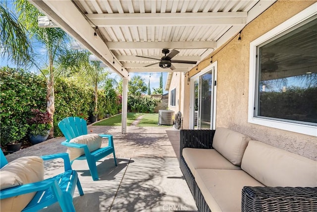 27814 Caraway Ln, Saugus, CA 91350 - fenced backyard with a ceiling fan, outdoor lounge area, and a patio area