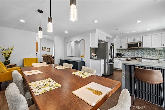 27814 Caraway Ln, Saugus, CA 91350 - dining area with dark wood finished floors and recessed lighting