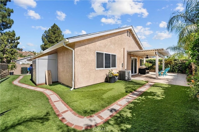 27814 Caraway Ln, Saugus, CA 91350 - back of house with a pergola, stucco siding, a fenced backyard, and a patio area
