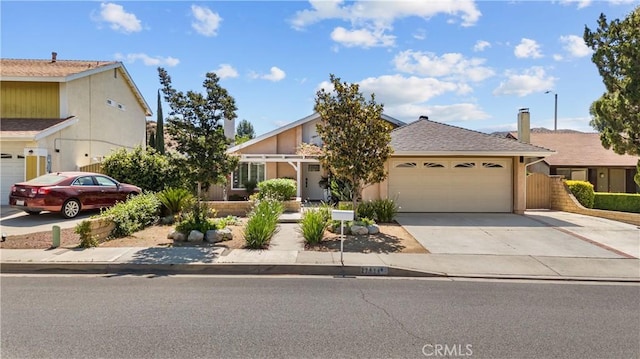 27814 Caraway Ln, Saugus, CA 91350 - view of front of house with an attached garage and concrete driveway