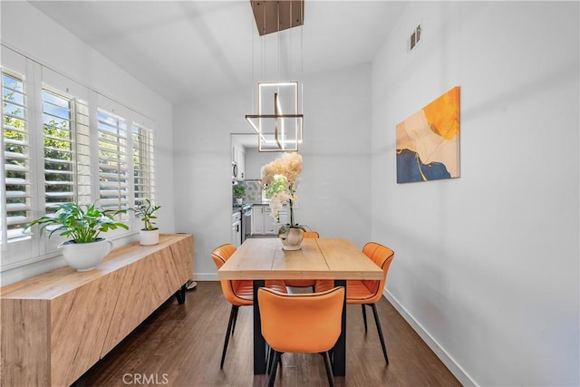 27814 Caraway Ln, Saugus, CA 91350 - dining space with dark wood-type flooring and a chandelier