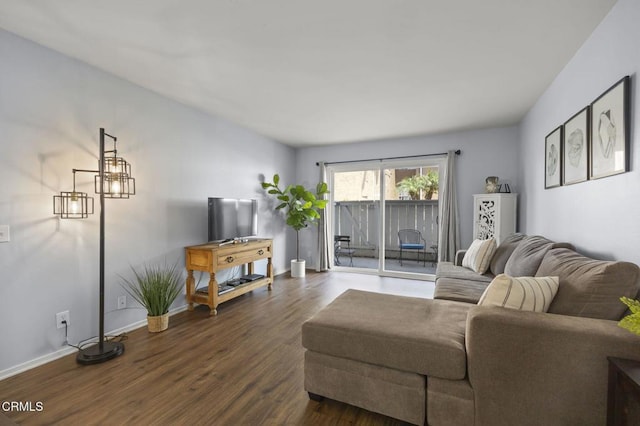 1300 Saratoga Ave Unit 306, Ventura, CA 93003 - living room featuring dark wood-style floors and baseboards
