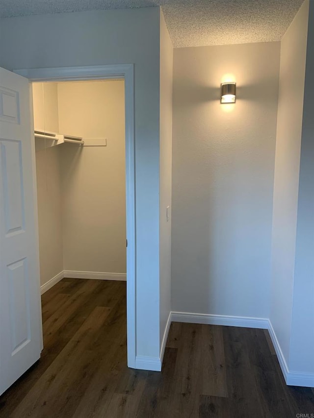 9847 Mission Vega Rd Unit 3, Santee, CA 92071 - walk in closet with dark wood-style floors