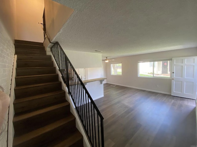 9847 Mission Vega Rd Unit 3, Santee, CA 92071 - stairs with a textured ceiling, wood finished floors, and ceiling fan