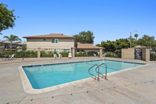 9847 Mission Vega Rd Unit 3, Santee, CA 92071 - community pool featuring a patio area