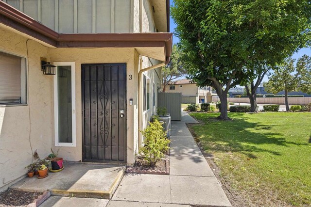 9847 Mission Vega Rd Unit 3, Santee, CA 92071 - property entrance with board and batten siding and stucco siding