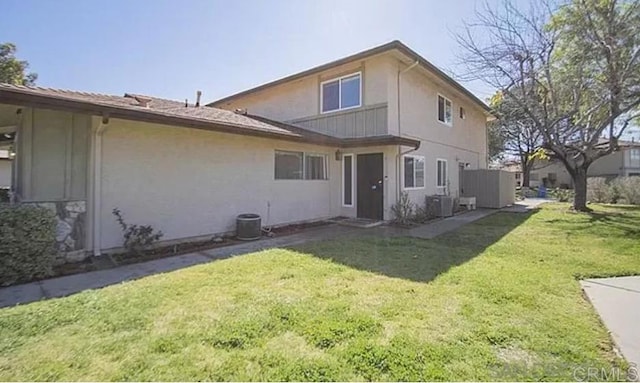 9847 Mission Vega Rd Unit 3, Santee, CA 92071 - back of house featuring stucco siding and a lawn