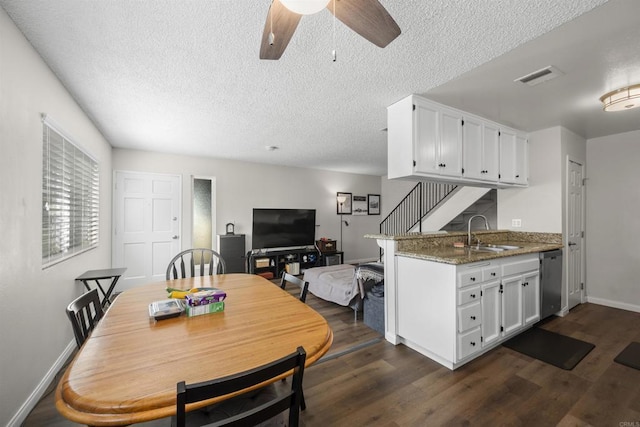9847 Mission Vega Rd Unit 3, Santee, CA 92071 - dining room featuring ceiling fan, a textured ceiling, dark wood-style floors, and stairway