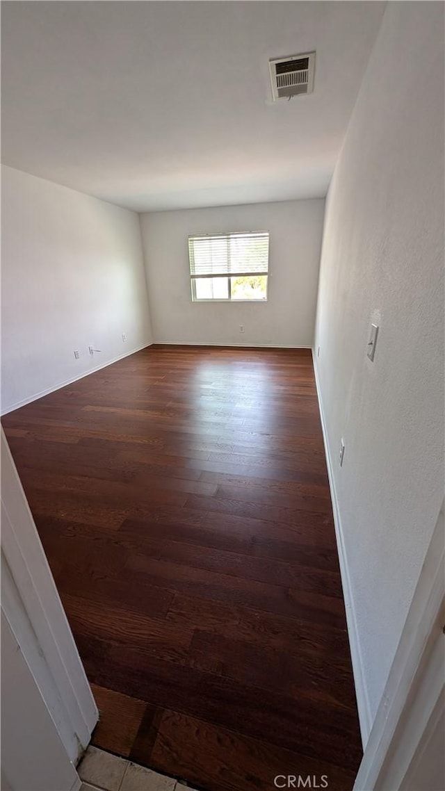 1679 Stoneside Dr, Hemet, CA 92545 - unfurnished room with wood finished floors and baseboards