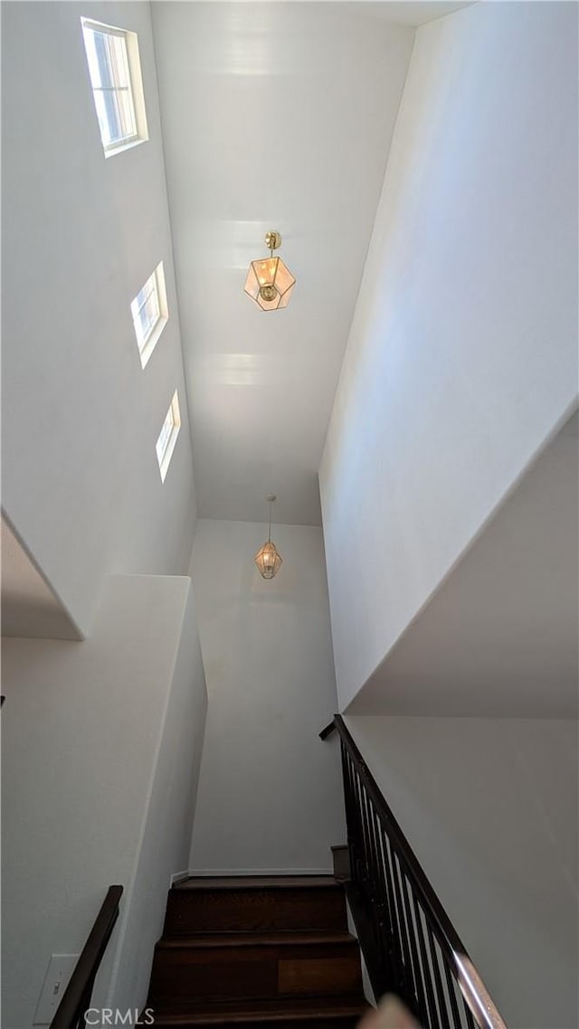 1679 Stoneside Dr, Hemet, CA 92545 - staircase featuring a towering ceiling