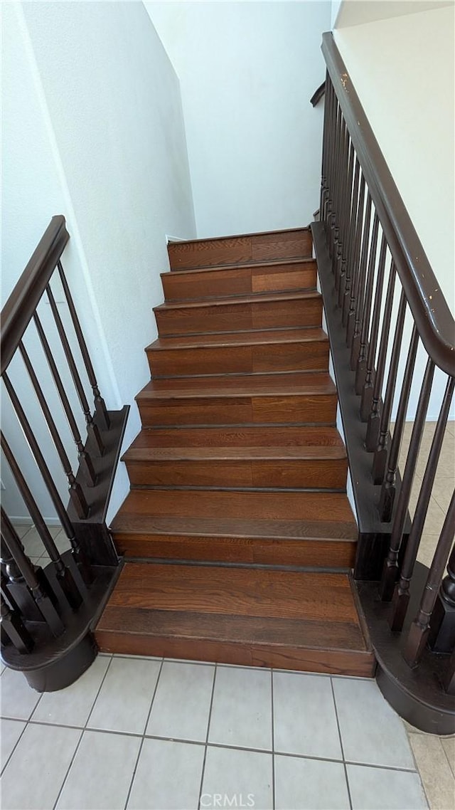 1679 Stoneside Dr, Hemet, CA 92545 - stairway featuring tile patterned flooring