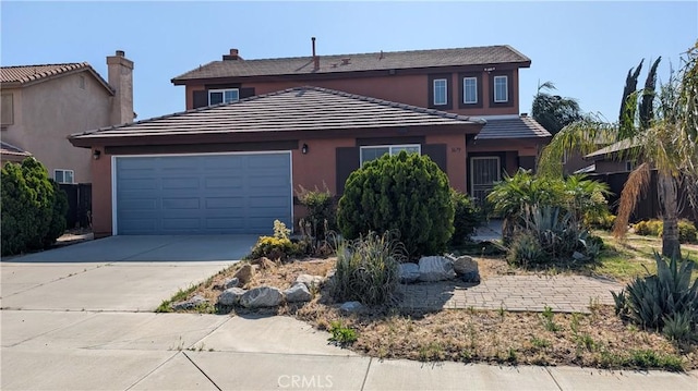 1679 Stoneside Dr, Hemet, CA 92545 - traditional-style home featuring driveway, a garage, and stucco siding