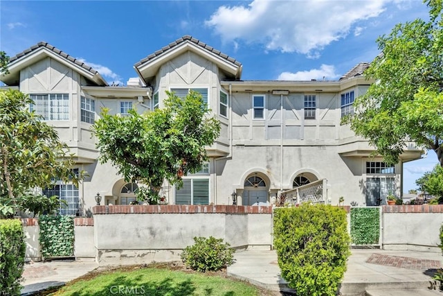 166 Alta St Unit B, Arcadia, CA 91006 - view of front facade featuring stucco siding and a fenced front yard