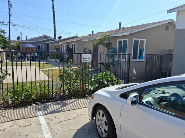 12043 Sycamore St, Norwalk, CA 90650 - ranch-style house with stucco siding and a gate