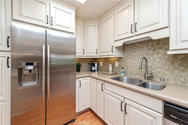 3238 San Amadeo Unit C, Laguna Woods, CA 92637 - kitchen featuring high end fridge, light countertops, dishwashing machine, and tasteful backsplash