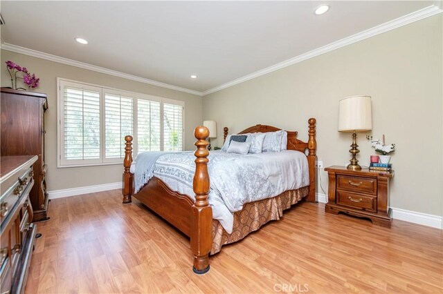3238 San Amadeo Unit C, Laguna Woods, CA 92637 - bedroom featuring light wood-type flooring, crown molding, and recessed lighting
