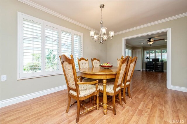 3238 San Amadeo Unit C, Laguna Woods, CA 92637 - dining room with a chandelier, ornamental molding, and light wood-type flooring
