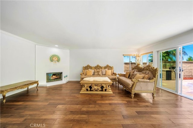 29212 Dean St, Laguna Niguel, CA 92677 - living room with ornamental molding, wood finished floors, and a glass covered fireplace