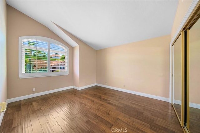 29212 Dean St, Laguna Niguel, CA 92677 - unfurnished bedroom with vaulted ceiling, wood finished floors, and a closet