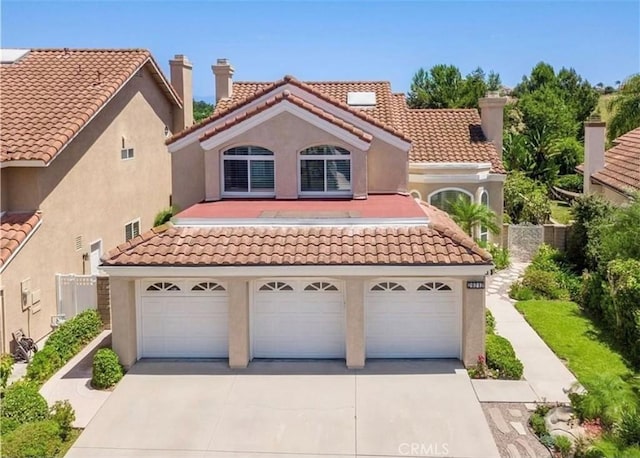 29212 Dean St, Laguna Niguel, CA 92677 - mediterranean / spanish home featuring driveway, stucco siding, and an attached garage