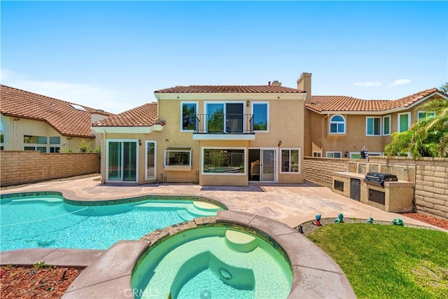 29212 Dean St, Laguna Niguel, CA 92677 - rear view of property featuring exterior kitchen, a tiled roof, a fenced backyard, stucco siding, and a chimney