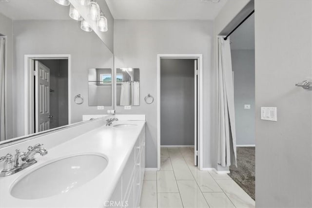 26327 Iris Ave Unit C, Moreno Valley, CA 92555 - bathroom with double vanity and marble finish floors