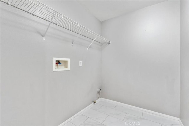 26327 Iris Ave Unit C, Moreno Valley, CA 92555 - laundry room featuring washer hookup, gas dryer hookup, and light marble finish floors
